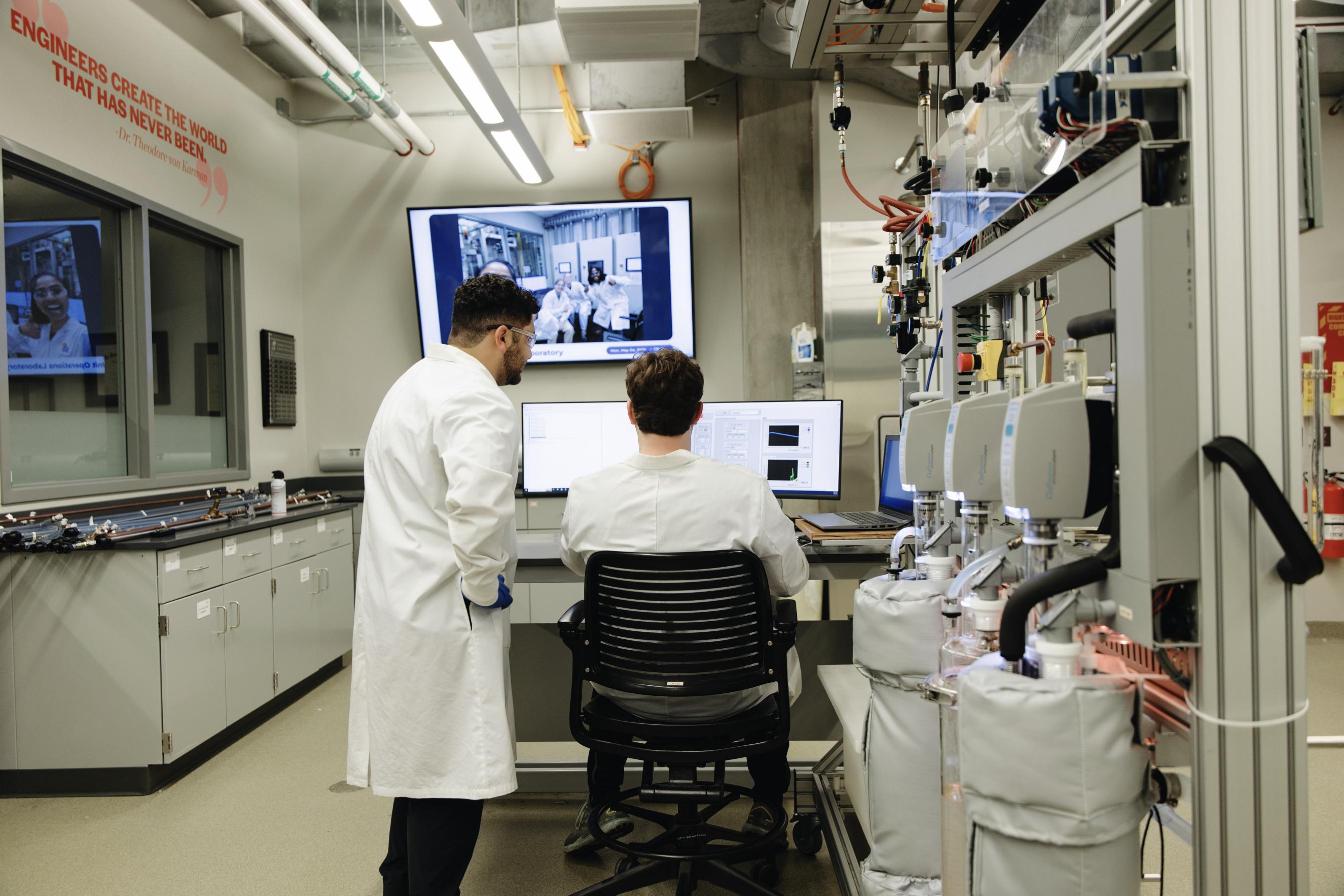 Two students at the Process Control Dual Monitors
