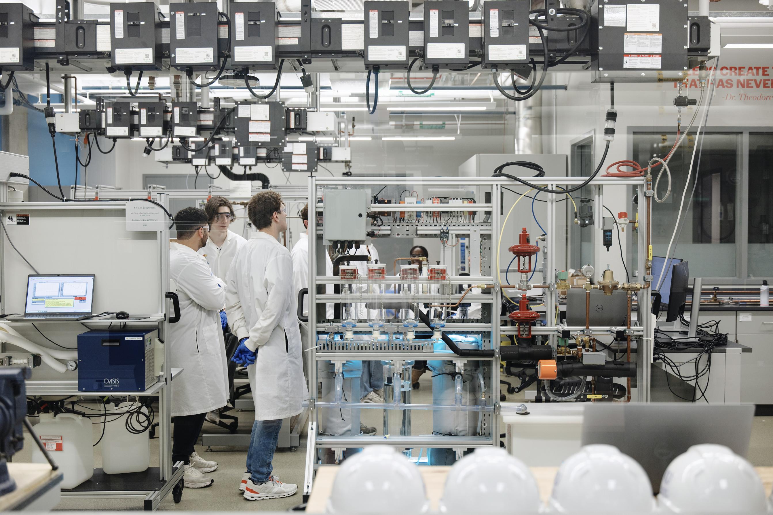 Four students in the process control lab